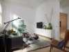 Современная гостиная со стильной мебелью и декорациями, Nolte Living.